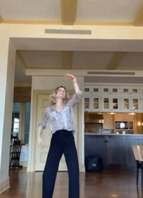 Kyra Sedgwick dancing in their family kitchen