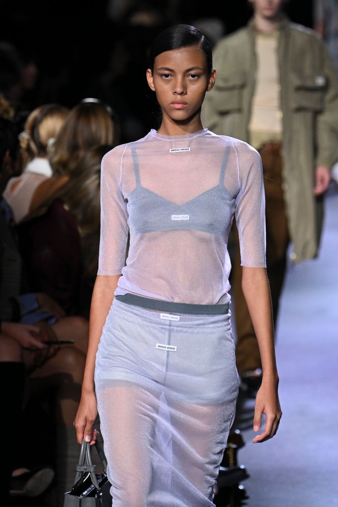 PARIS, FRANCE - OCTOBER 04: A model walks the runway during the Miu Miu Ready to Wear Spring/Summer 2023 fashion show as part of the Paris Fashion Week on October 4, 2022 in Paris, France. (Photo by Victor VIRGILE/Gamma-Rapho via Getty Images)