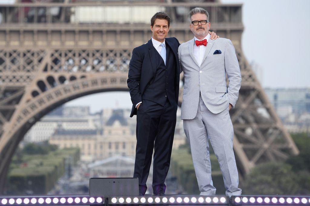 Tom Cruise and Director Christopher McQuarrie attend the Global Premiere of 'Mission: Impossible - Fallout' at Palais de Chaillot on July 12, 2018 in Paris, France