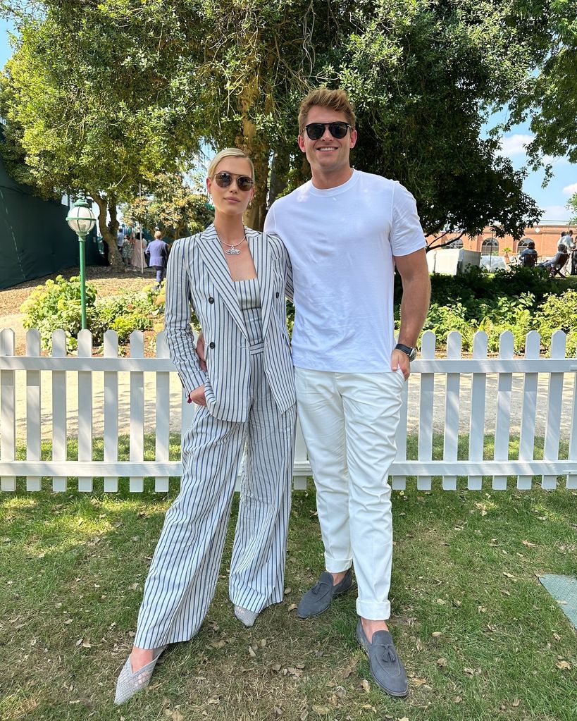 Amelia spencer in striped suit with husband