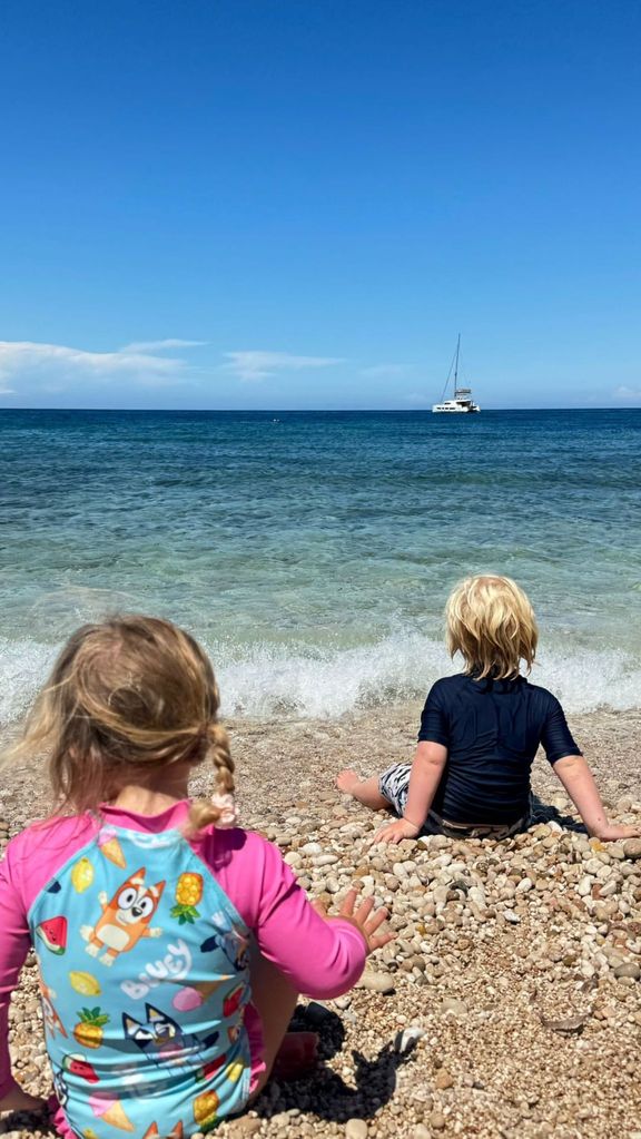 Carrie shares a photo of her daughter Romy and son Wilfred looking out into the ocean