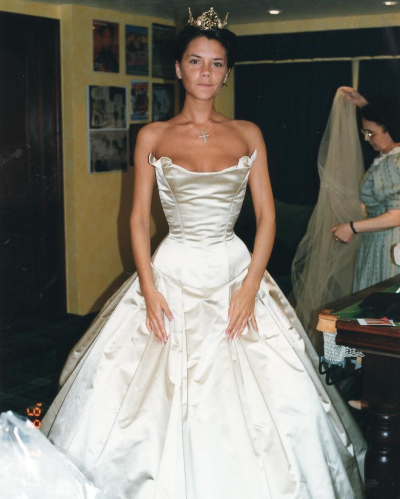 Victoria Beckham trying on her Vera Wang bridal gown