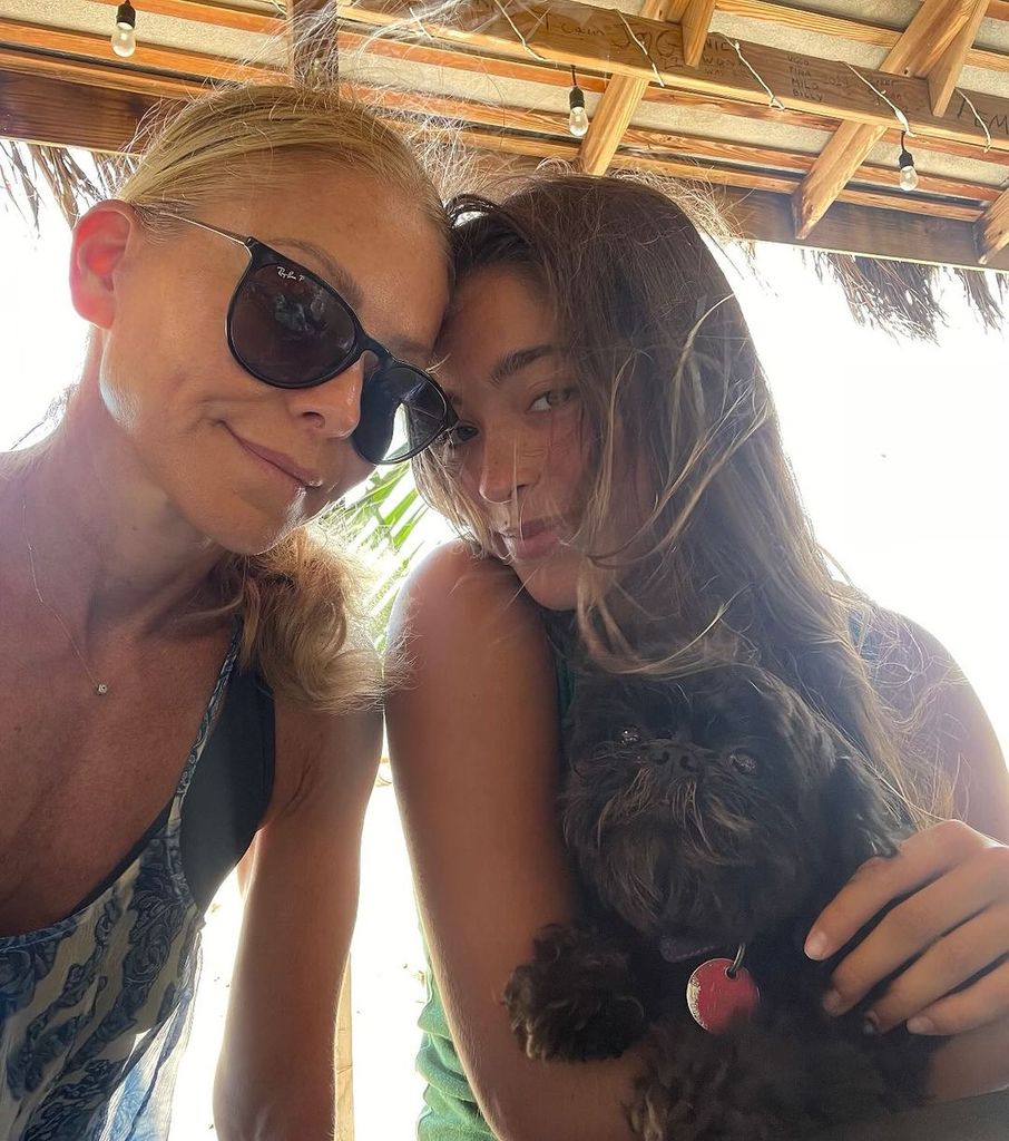 Kelly Ripa and daughter Lola with family dog Lena 