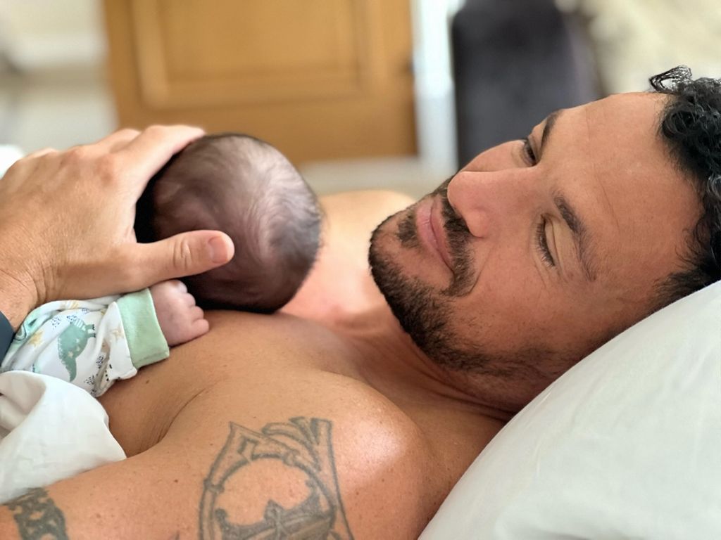 peter andre cradling baby daughter