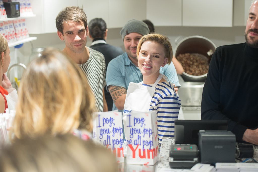 Scarlett Johansson and her husband Romain Dauriac attend the Opening of their New Store "Yummy Pop", on October 22, 2016 in Paris, France