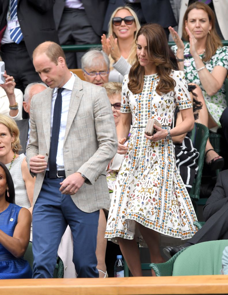 Kate and Prince William walking down steps