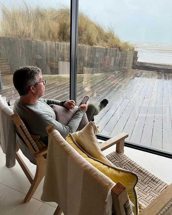 John Torode relaxing inside their holiday let