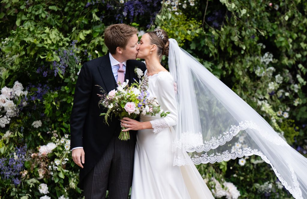 Hugh Grosvenor kissing his new wife Olivia Henson