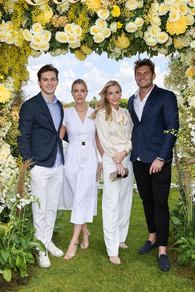 Samuel Aitken, Lady Eliza Spencer, Lady Amelia Spencer and Greg Mallett pose under floral arch