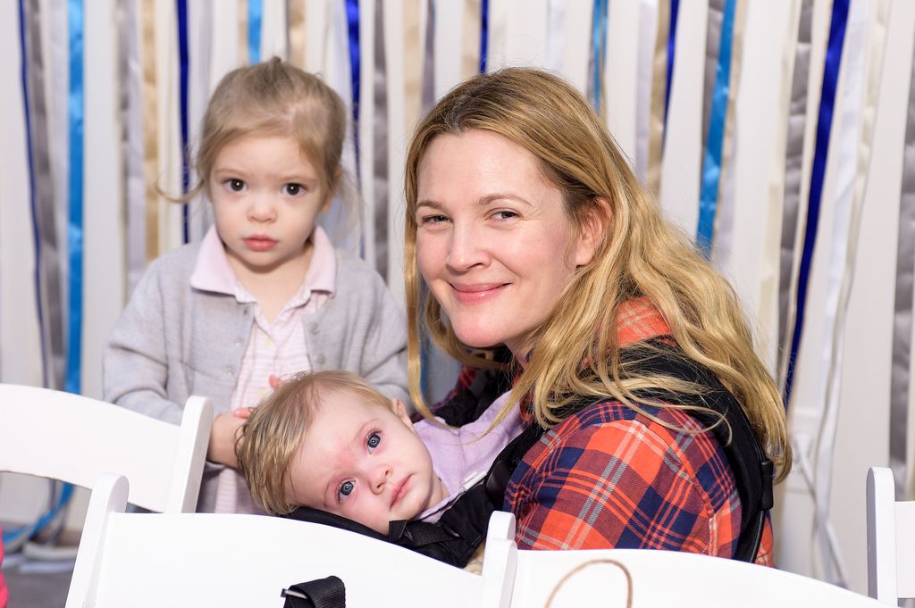 LOS ANGELES, CA - DECEMBER 13: Drew Barrymore, Olive Barrymore Kopelman and Frankie Barrymore Kopelman attend Baby2Baby Holiday Party Presented By The Honest Company  on December 13, 2014 in Los Angeles, California. (Photo by Stefanie Keenan/Getty Images for Baby2Baby)