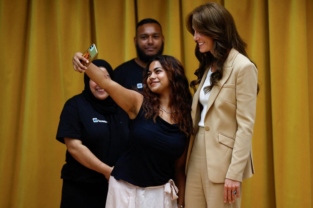 The Princess of Wales poses for a selfie during her visit at Streets of Growth in September 2023