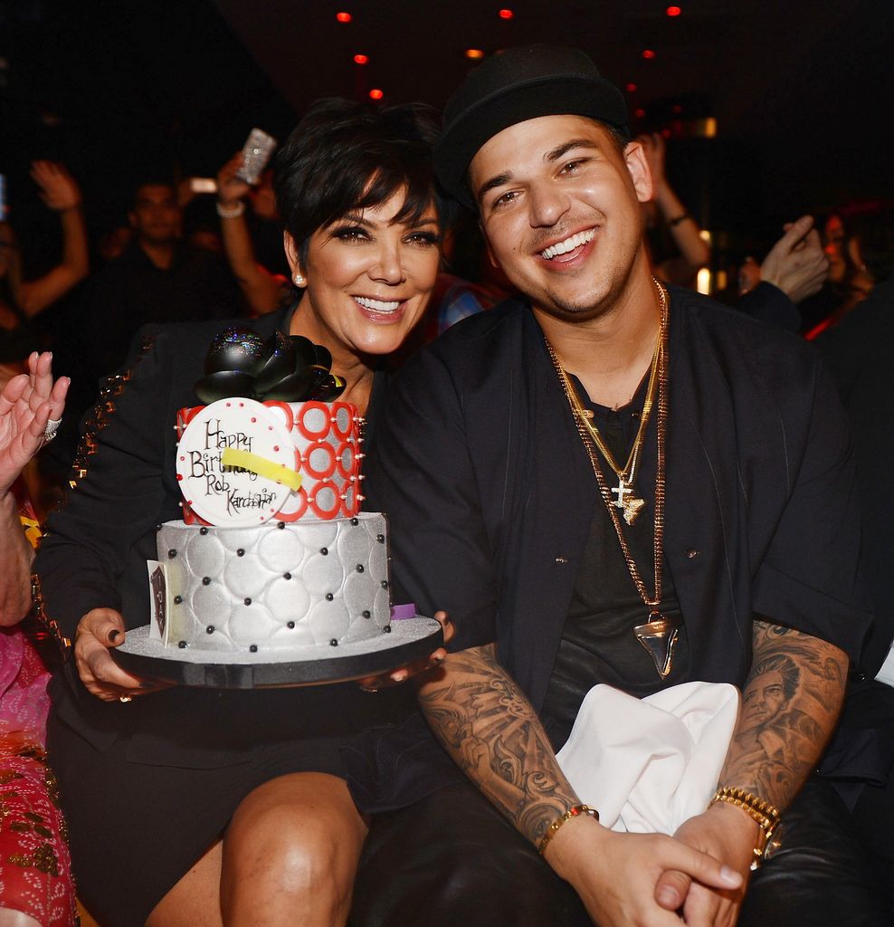 Rob Kardashian with Kris Jenner and a birthday cake