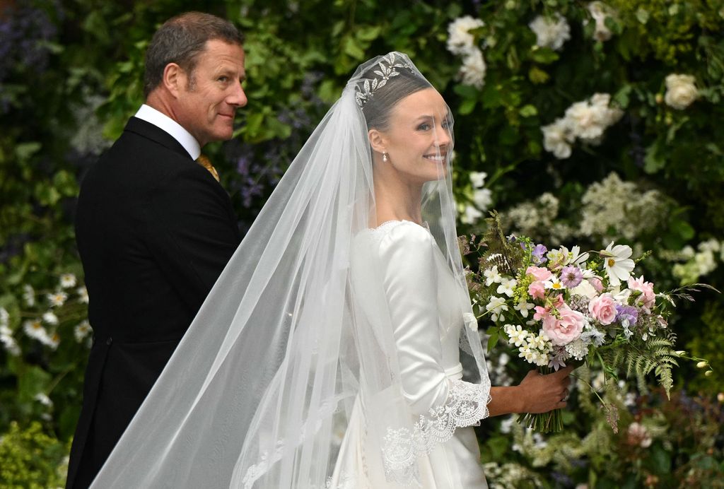 Olivia Henson arrives to attend her wedding to the Duke of Westminster, at Chester Cathedral in Chester, northern England on June 7, 2024. (Photo by Oli SCARFF / AFP) (Photo by OLI SCARFF/AFP via Getty Images)