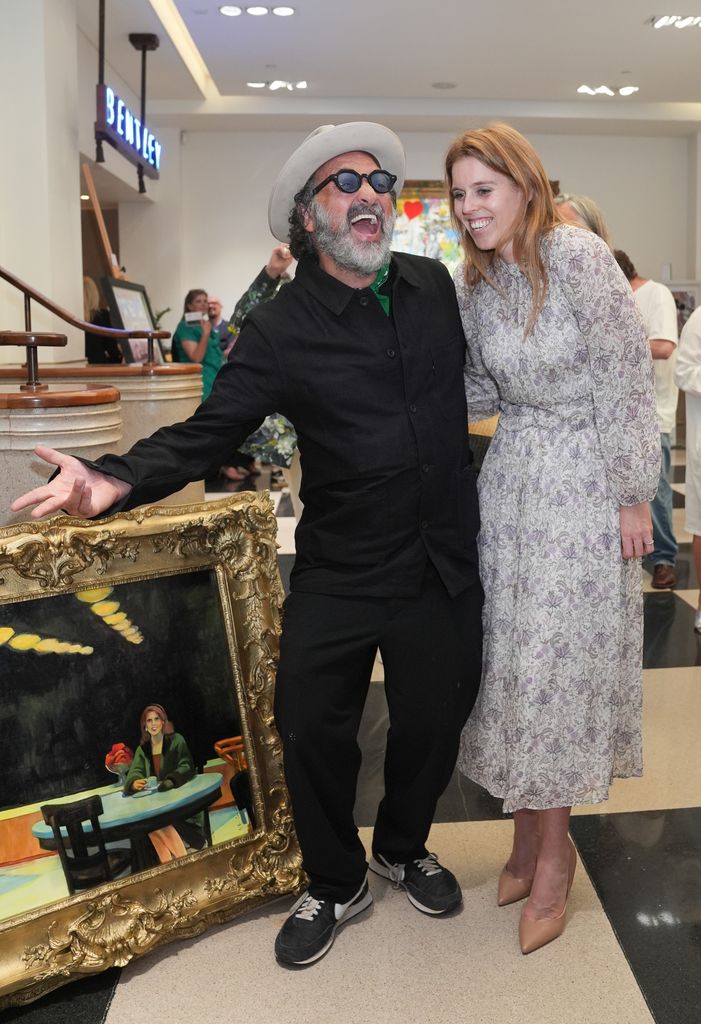 Princess Beatrice laughing with Mr Brainwash 