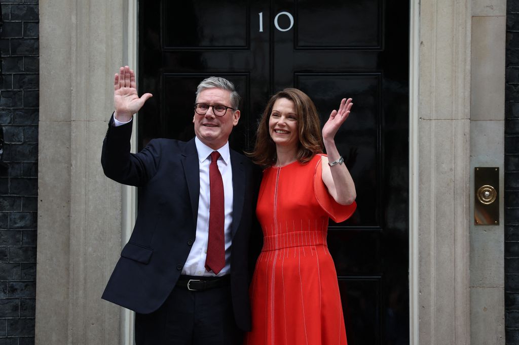 Keir Starmer and wife Victoria wave from the steps of 10 Downing Street