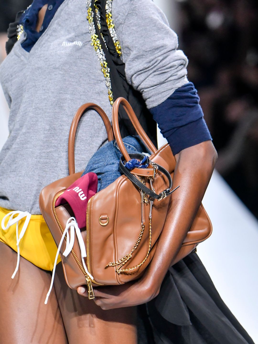 A model walks the runway during the Miu Miu Ready to Wear Spring/Summer 2024 fashion show