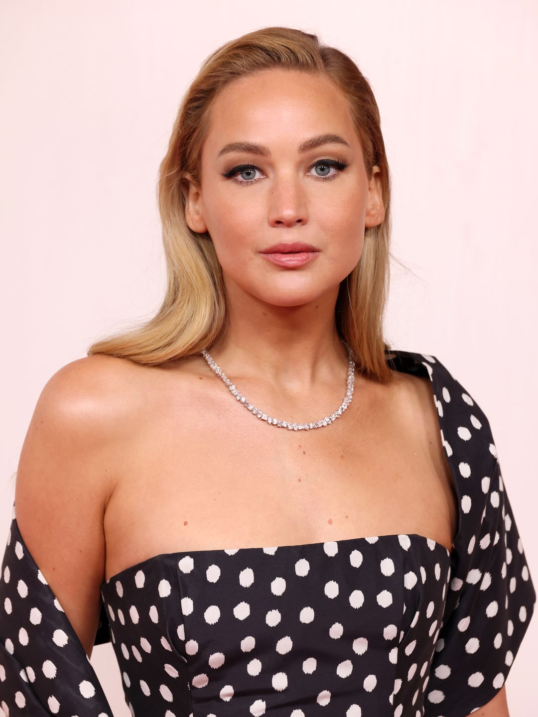 Jennifer Lawrence smiling at the Oscars 