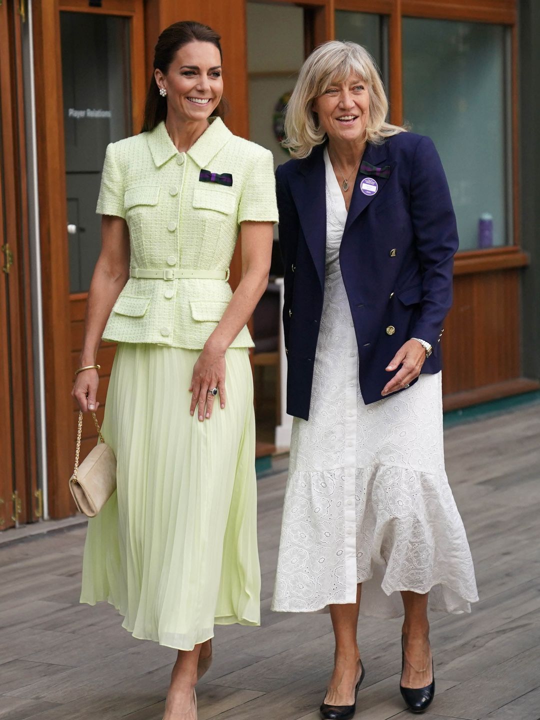 Kate Middleton walking with a woman