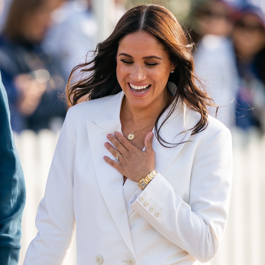 Meghan Markle gives son Archie a piggyback in endless garden in clip you might have missed