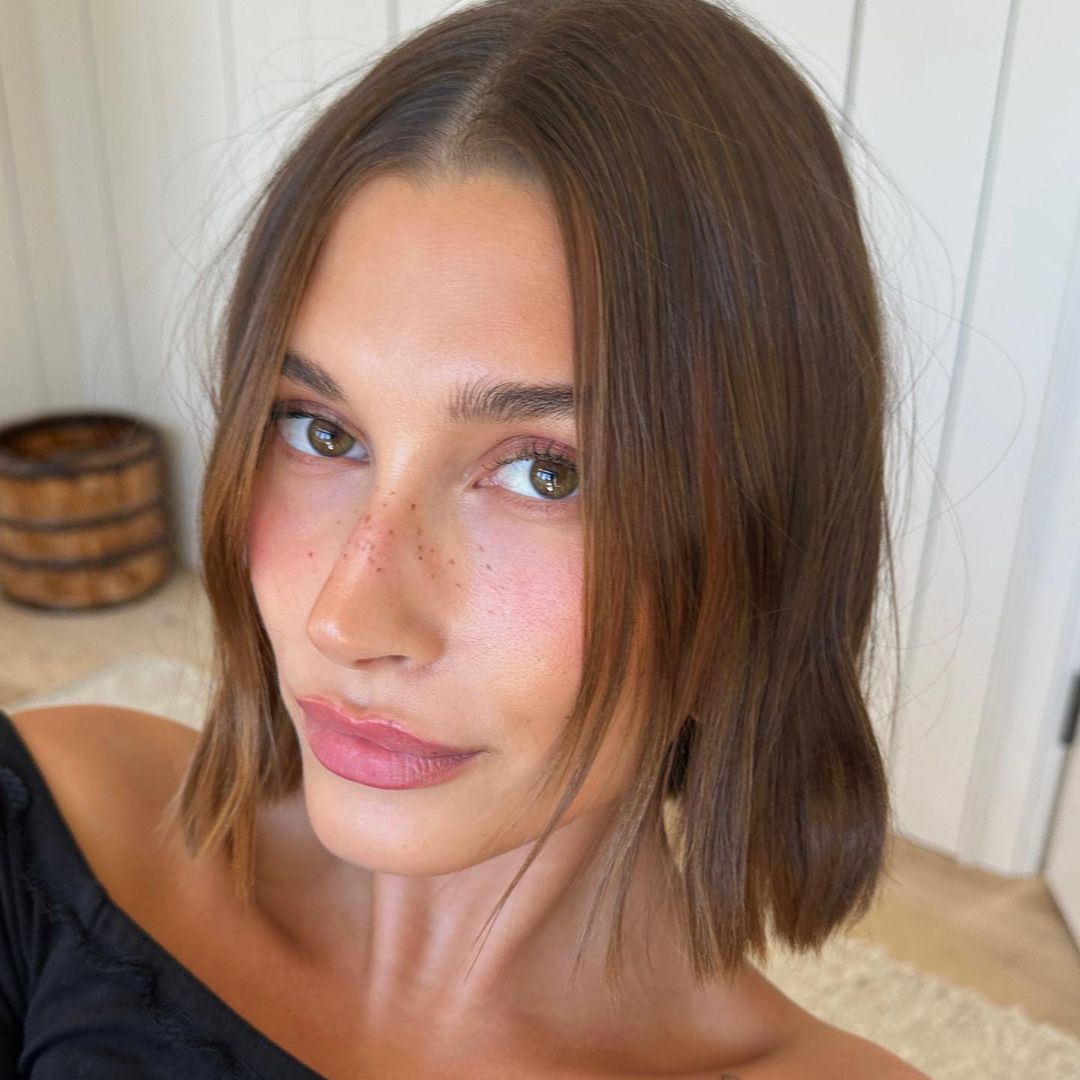 Hailey Bieber just revealed her entire 'peachy beachy' summer makeup routine