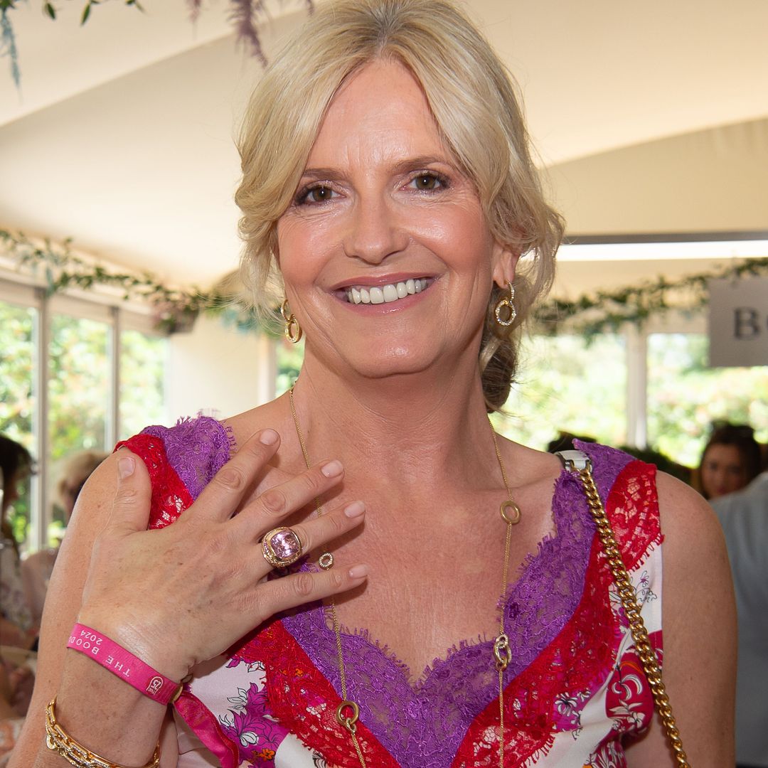 Penny Lancaster turns heads in slinky lace slip dress and skyscraper heels