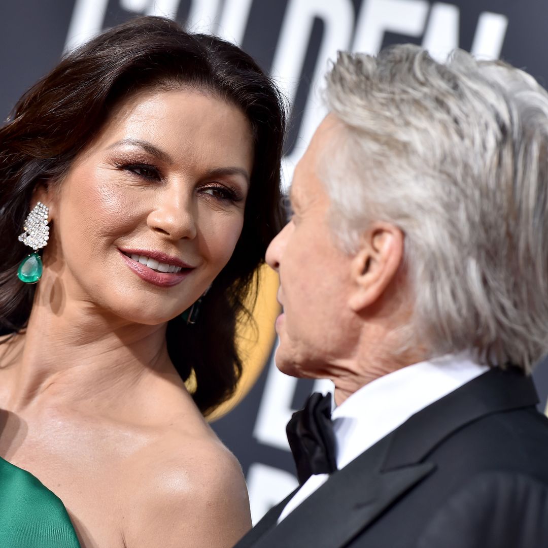 Catherine Zeta-Jones and husband Michael Douglas look so loved-up during star-studded outing