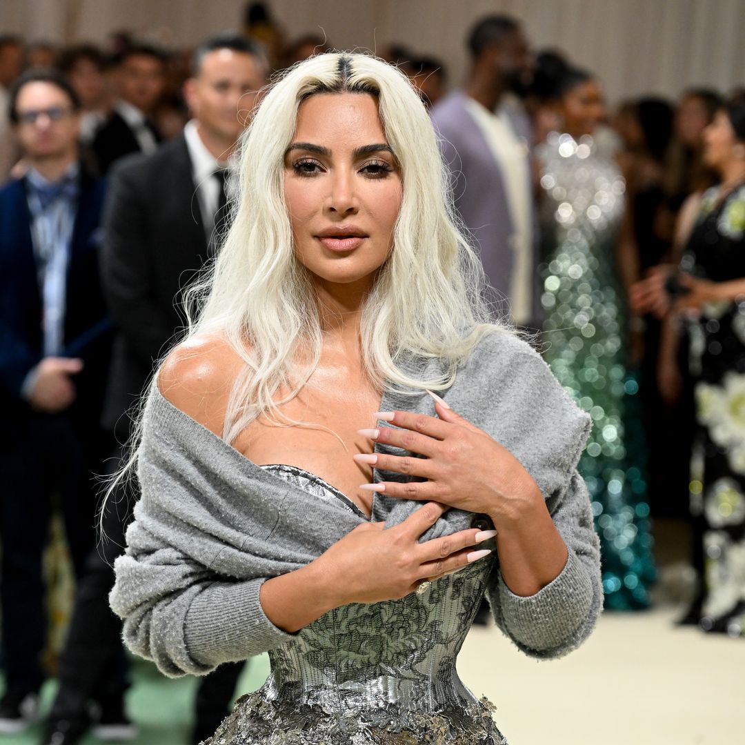 Kim Kardashian sparks debate as she steps out in ultra waist-cinching gown at Met Gala