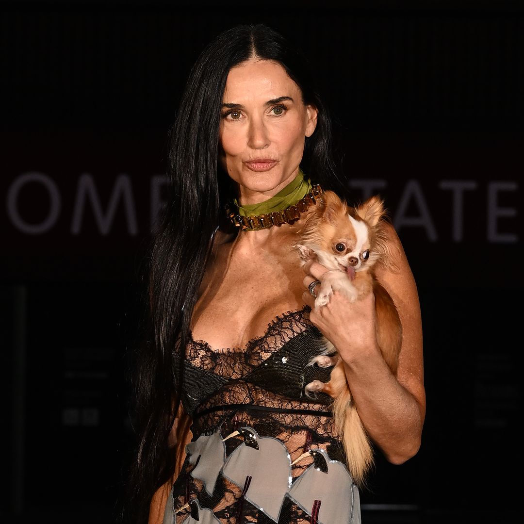 Demi Moore, 61, showcases her ageless physique in sheer lace dress with her chihuahua Pilaf