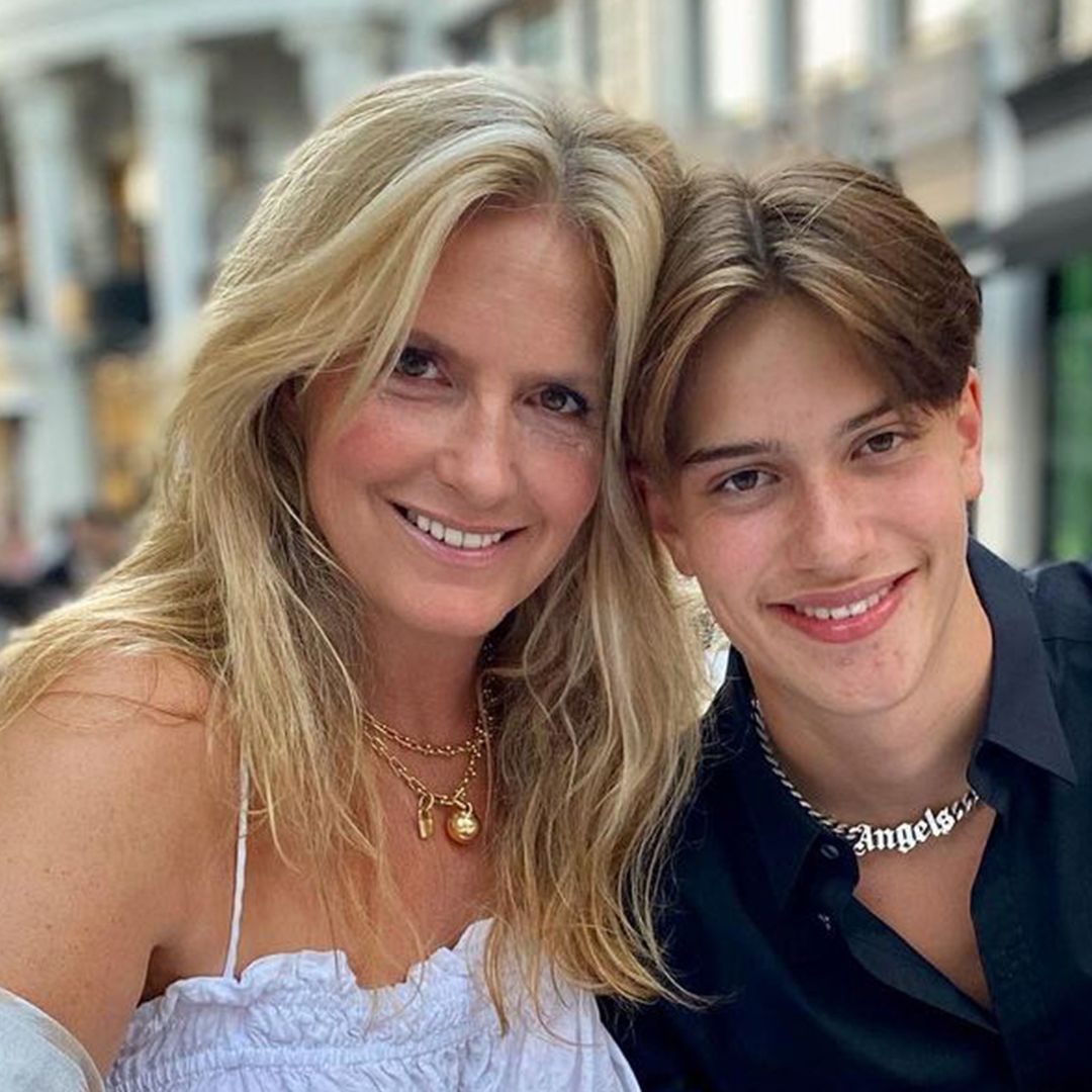 Penny Lancaster rocks crochet mini dress in holiday snap with towering model son Alastair