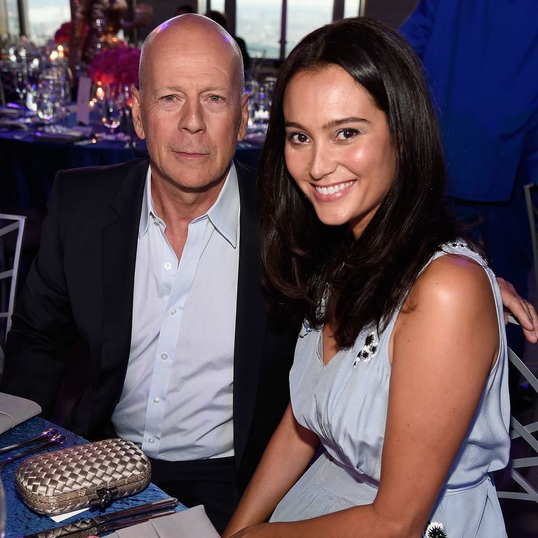 Bruce Willis cozies up to wife Emma Heming amid health battle in rare peek inside their private celebration with daughters