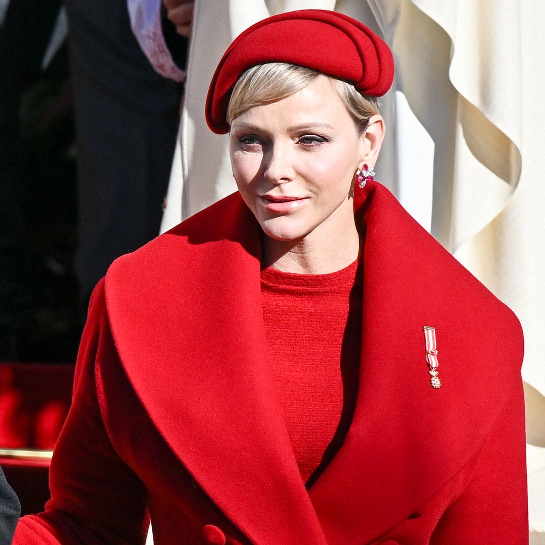 Princess Charlene looks sublime in scarlet alongside twins Prince Jacques and Princess Gabriella