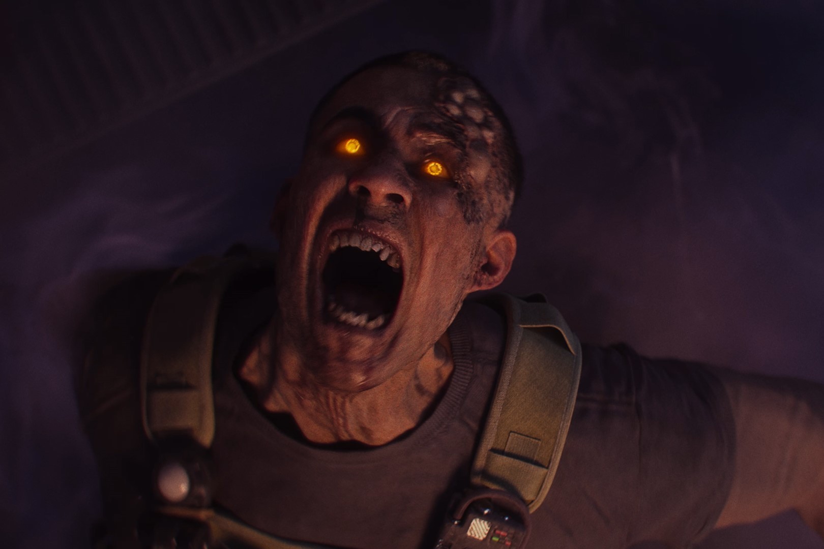 A zombie in Call of Duty Modern Warfare 3 screaming with glowing yellow eyes