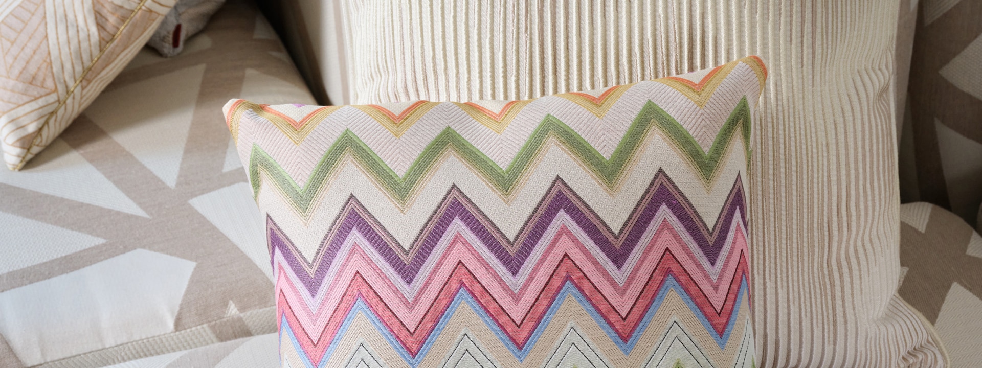 A zig zag multicoloured pillow