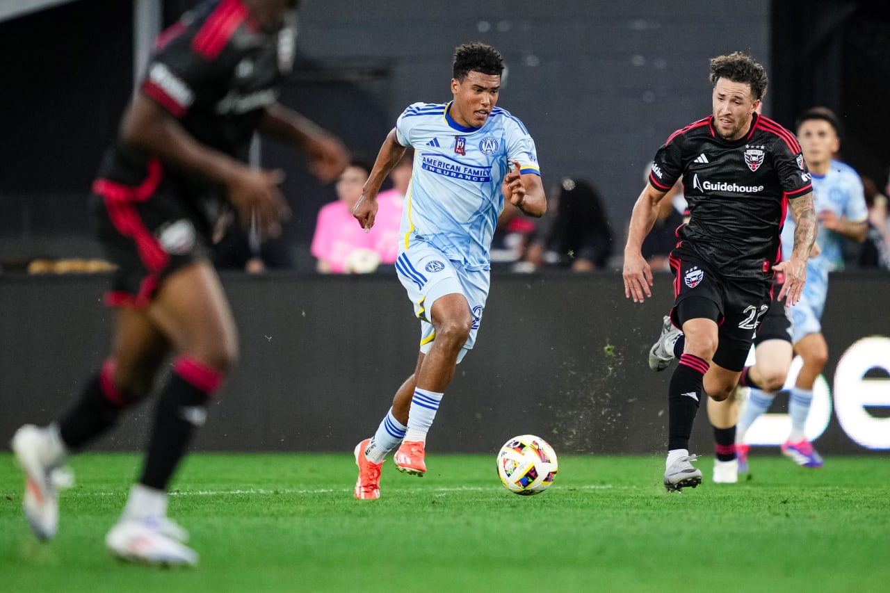 Atlanta United defender Caleb Wiley #26 dribbles during the first half of the match against the D.C. United at Audi Field in Washington,  on Wednesday June 19, 2024.