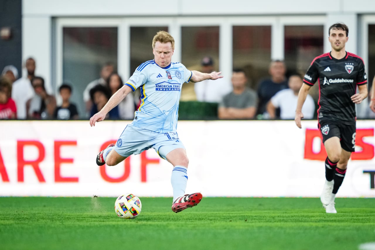 Atlanta United midfielder Dax McCarty #13 attempts a shot during the first half of the match against the D.C. United at Audi Field in Washington,  on Wednesday June 19, 2024.