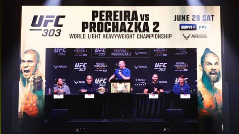 Dana White on stage with Alex Pereira and Jiří Procházka for the UFC 303 press conference at T-Mobile Arena in Las Vegas. (Chris Unger/Zuffa LLC via Getty Images)
