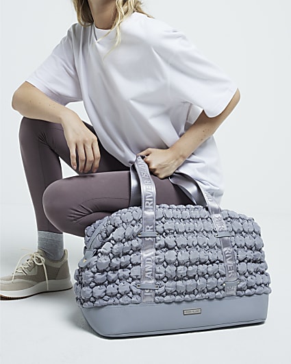 Grey quilted texture travel bag