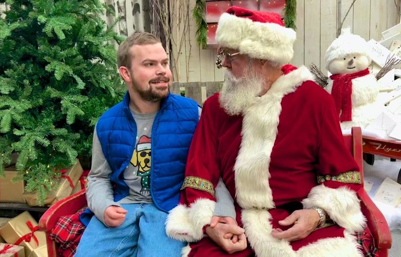 Kevin and Santa in 2017. Kevin Riley met Santa Claus, also known as John Harmeling, several years ago and visited every year until 2019 before the pandemic started. By happy accident, the two were reunited at Molbak’s Garden + Home center Nov. 25, 2023.