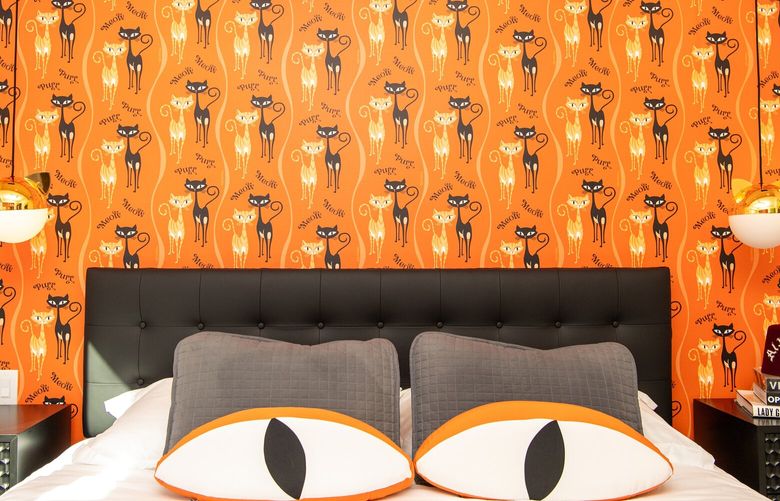 A sunny cat-themed bedroom features custom wallpaper by Shag, a.k.a. artist Josh Agle, at the Shag house on Wednesday, Jan. 10, 2024, in Palm Springs, California. (Mariah Tauger/Los Angeles Times/TNS)