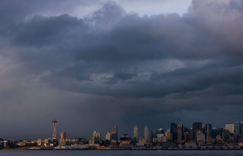 Storm clouds are seen above the Seattle skyline Monday, Feb. 27, 2023.  
LO 223190