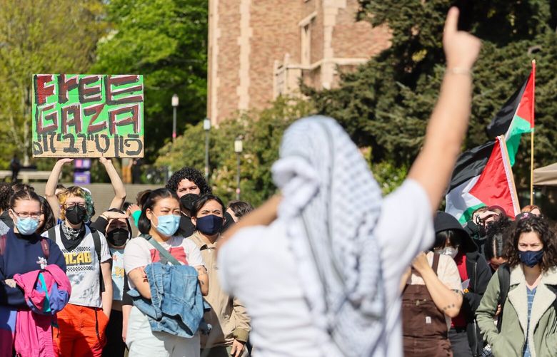 A protester rallies during the UW United Front for Palestinian Liberation’s “liberated zone Wednesday afternoon on the Quad at the University of Washington in Seattle, Washington, on May 1, 2024.  226785