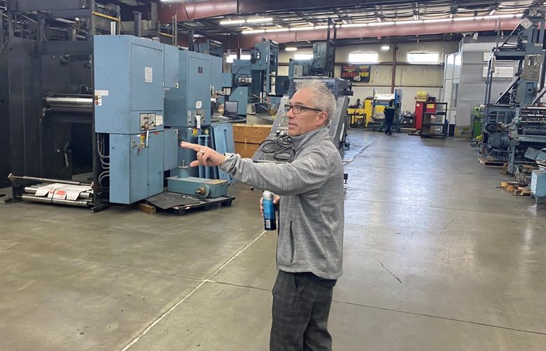 Tom Loesch, founder and president of imPRESSions Worldwide, in the company’s Skagit County printing-press facility.