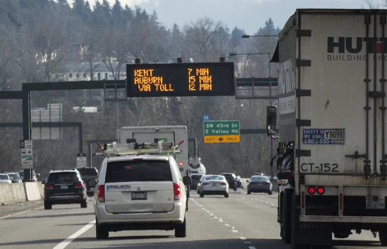 Cars travel southbound on Highway 167, just south of I-405 and before the exit for SW 41 St. in Kent Friday, February 9, 2024.    At around 2 p.m., the toll fee was $5.50.  By 2:20 it had raised to $8.75.    The. maximum toll now is $10.00.  It will rise to $15 on March 1.

 226114