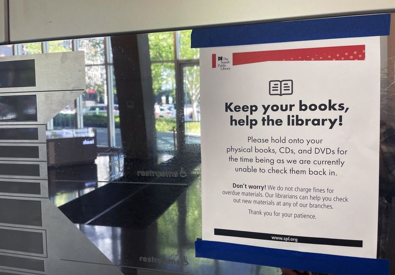 The library is asking people to not return books right now, as it has no way to check them back in. (David Gutman / The Seattle Times)