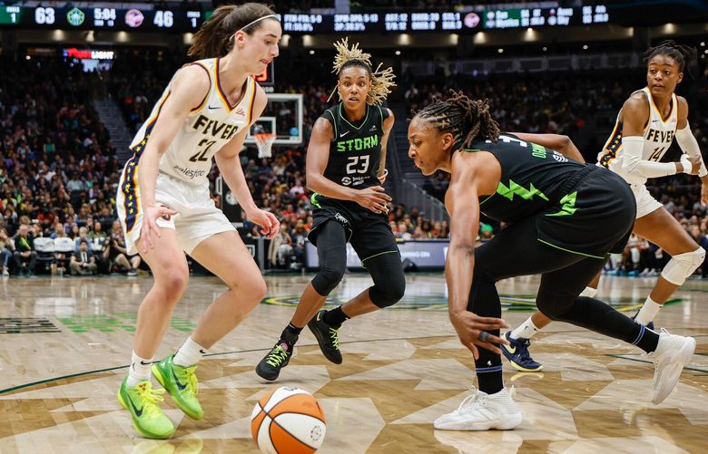 Seattle’s Nneka Ogwumike knocks the ball away from Indiana’s Caitlin Clark along the baseline in the second half.  The Indiana Fever played the Seattle Storm in WNBA Basketball Thursday, June 27, 2024 at Climate Pledge Arena, in Seattle, WA. The Indiana Fever played the Seattle Storm in WNBA Basketball Thursday, June 27, 2024 at Climate Pledge Arena, in Seattle, WA. 227220