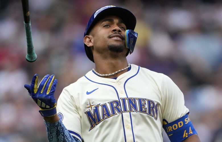 Seattle Mariners’ Julio Rodríguez reacts after lining out against the Minnesota Twins during the sixth inning of a baseball game Sunday, June 30, 2024, in Seattle. (AP Photo/Lindsey Wasson) WALW729 WALW729