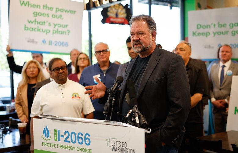 Brian Heywood, founder of Let’s Go Washington, and others hold a press conference regarding a ballot initiative I-2066 “Stop the Gas Ban” at Mayuri, a grocery store in Redmond, on Tuesday, July 2, 2024. 227407