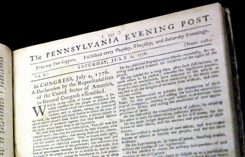 In this Thursday, June 28, 2012 photo is the first newspaper printing of the Declaration of Independence on July 6, 1776 in The Pennsylvania Evening Post, according to Scott Stephenson. This artifact and others hidden treasures will remain under wraps in their anonymous location until late 2015, when The Museum of the American Revolution is scheduled to open in Philadelphia’s historic district. (Brynn Anderson / The Associated Press)