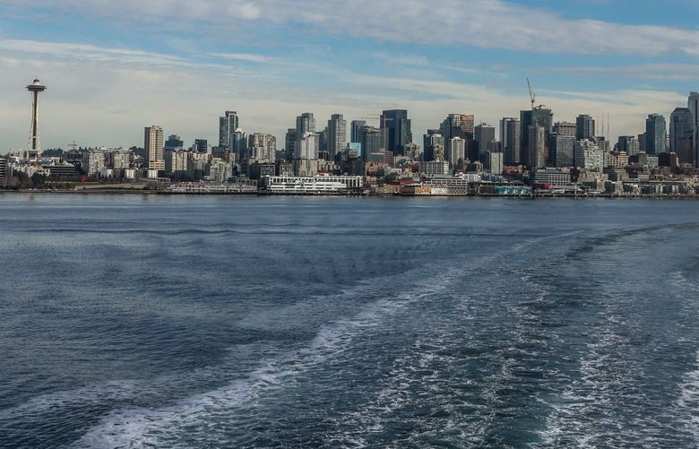 For PACIFIC MAGAZINE STORY

The Seattle skyline in the wake of the M/V Tacoma Tuesday afternoon en route to Bainbridge Island, Washington, on January 16, 2024. 225927