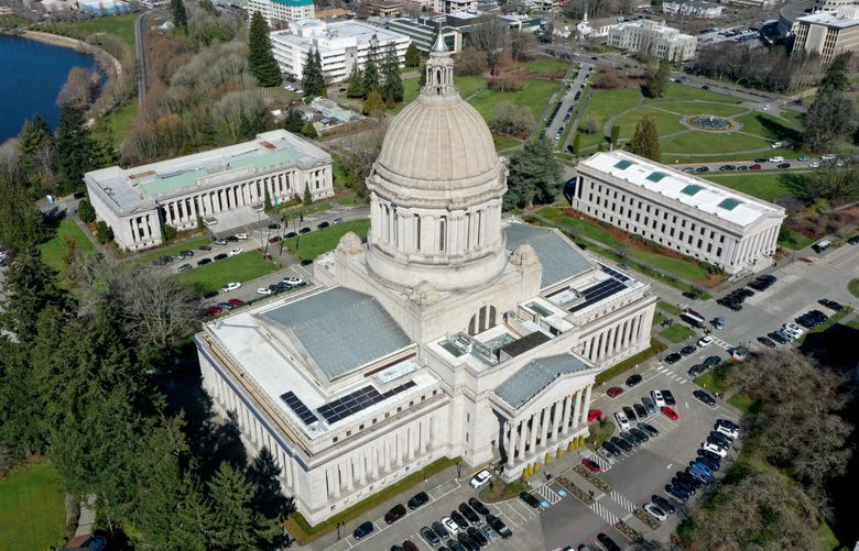 The Washington State Capitol Building and campus photographed from the air with Capitol Lake and Entrance Channel behind it in Olympia, Washington, on Wednesday, March 22, 2023.